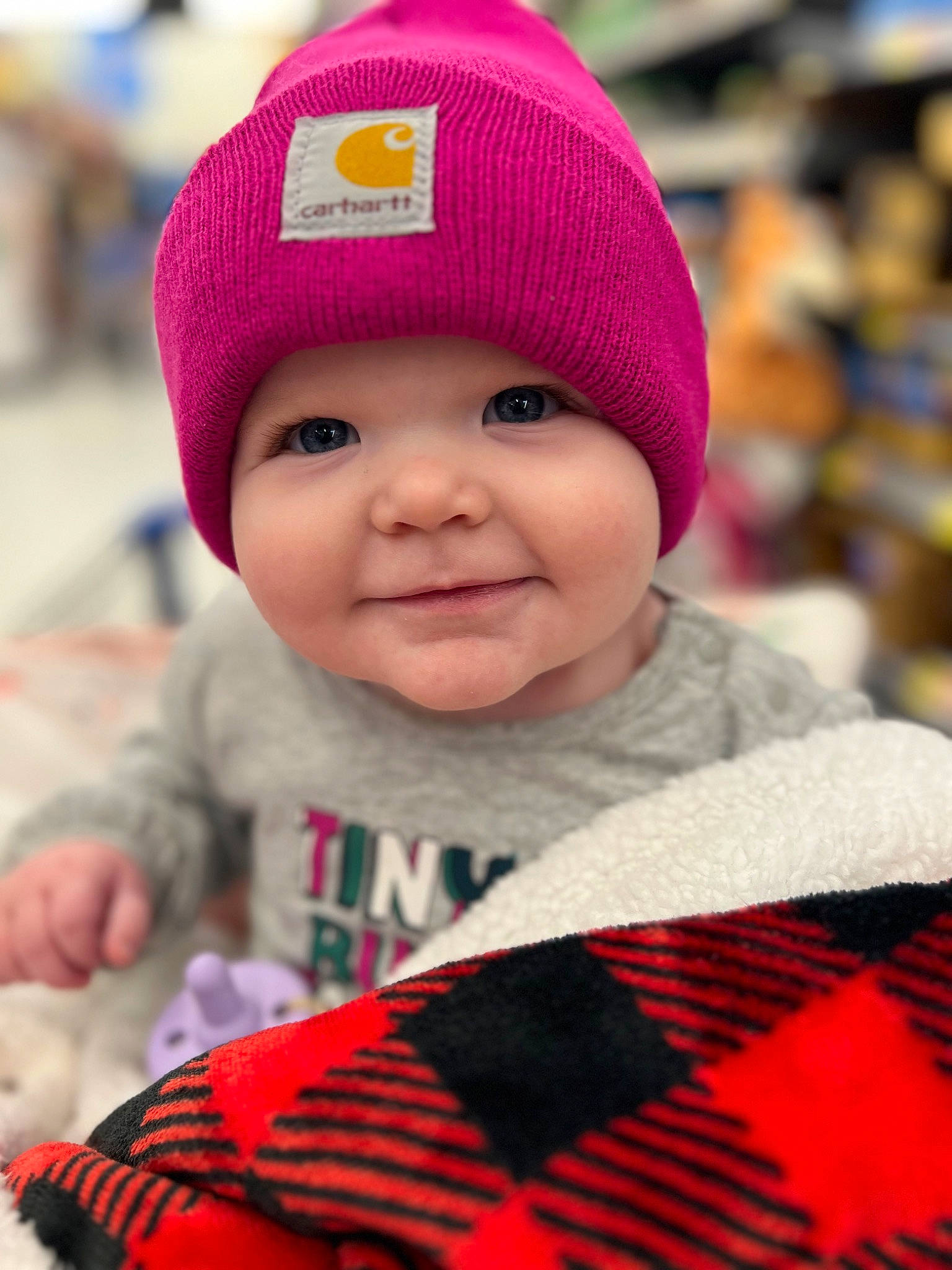Kenna is registered to the contest to win money with this photo: baby, baby_toddler_clothing, cap, cheek, eye, happy, headgear, headwear, joy, organ, outerwear, people, person, photograph, pink, product, red, skin, sleeve, smile