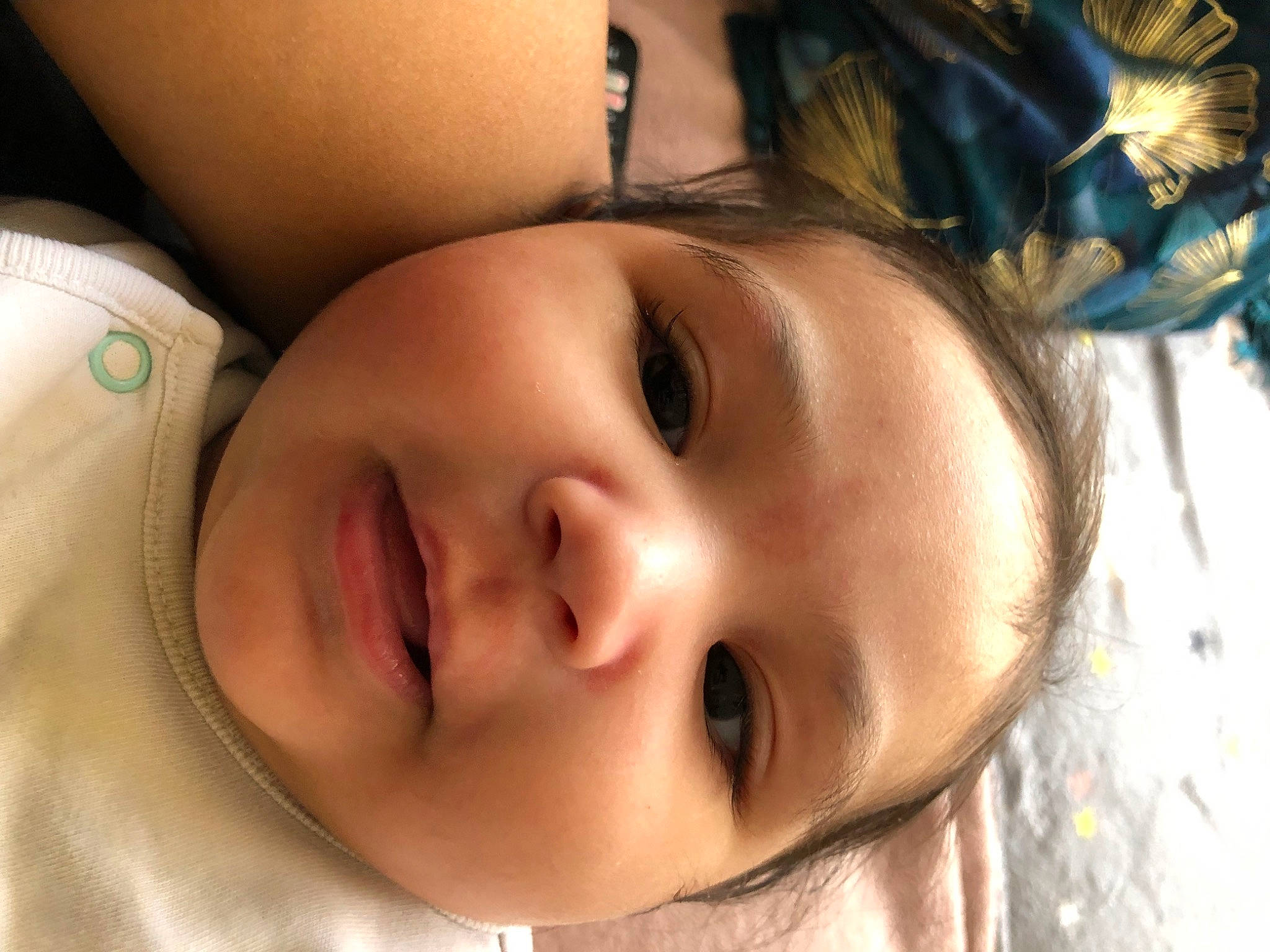 Maisie is registered to the contest to win money with this photo: baby, cheek, child, eyebrow, eyelash, forehead, fun, grass, happy, human_body, iris, jaw, lip, mouth, neck, nose, person, plant, skin, smile