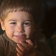 Asher joined the competition — help win amazing prizes! child, smiling, face, portrait, young, short_hair, hand, cozy, closeup, happy, cute, indoor, warm_light, expression, person, kid, skin, eyebrows, eyes, clothing