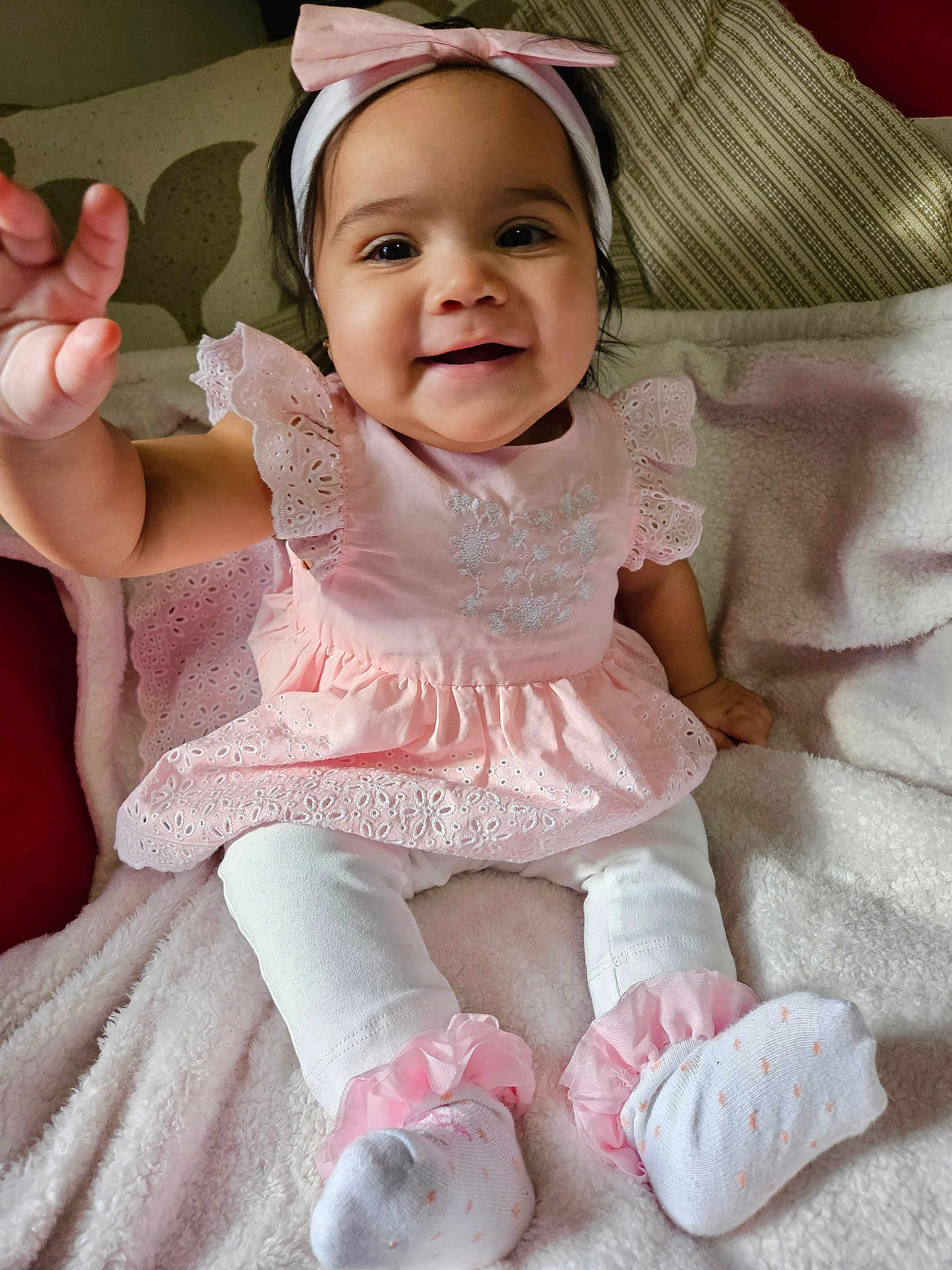 Jelenys is registered to the contest to win money with this photo: baby, bodypart, clothing, couch, cushion, face, finger, furniture, hand, happy, hat, head, homedecor, hosiery, person, photography, portrait, sitting, smile, sock