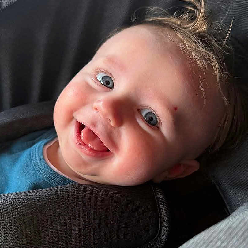 Ethan is registered to the contest to win money with this photo: baby, babylaughing, face, happy, head, person, photography, portrait, smile