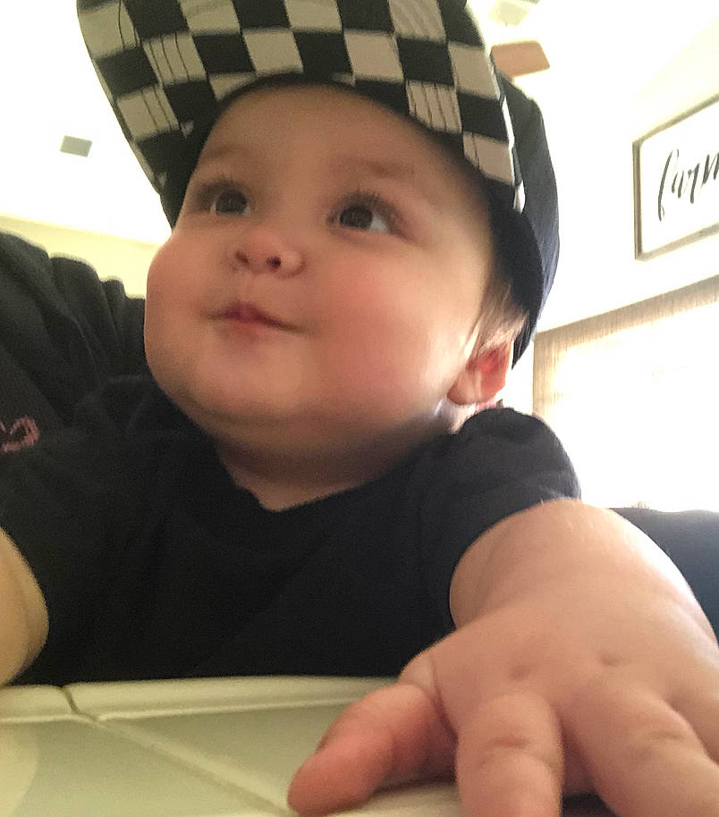 Kaine Sincere Carrrales is registered to the contest to win money with this photo: baby, cap, cheek, chin, cool, eyebrow, eyelash, facial_expression, finger, gesture, happy, headgear, headwear, helmet, mouth, nose, person, photograph, skin, sleeve