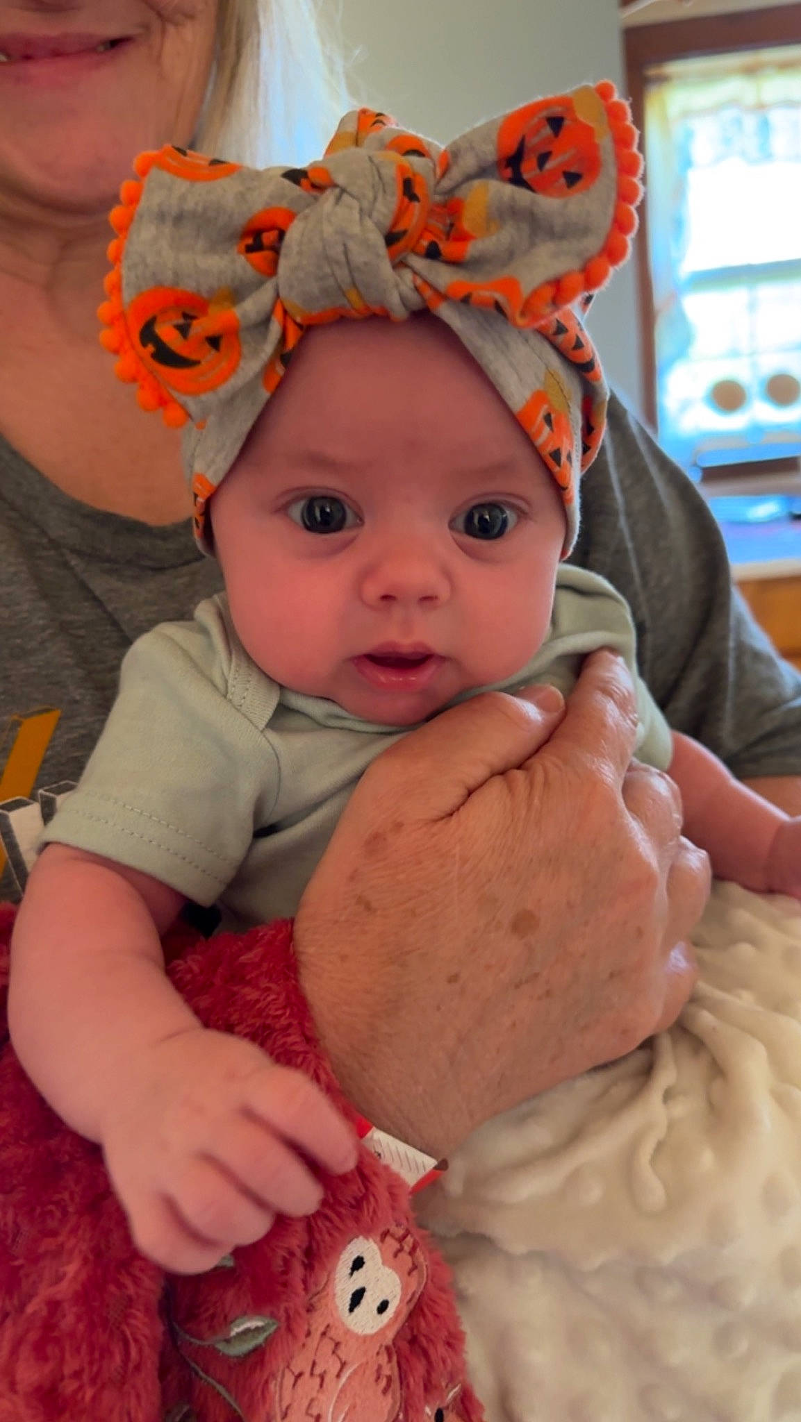 Sophia is registered to the contest to win money with this photo: baby, baby_toddler_clothing, beanie, cap, cheek, child, costume_hat, fashion_accessory, fun, hair_accessory, happy, hat, headband, headwear, iris, person, pink, sitting, skin, sun_hat