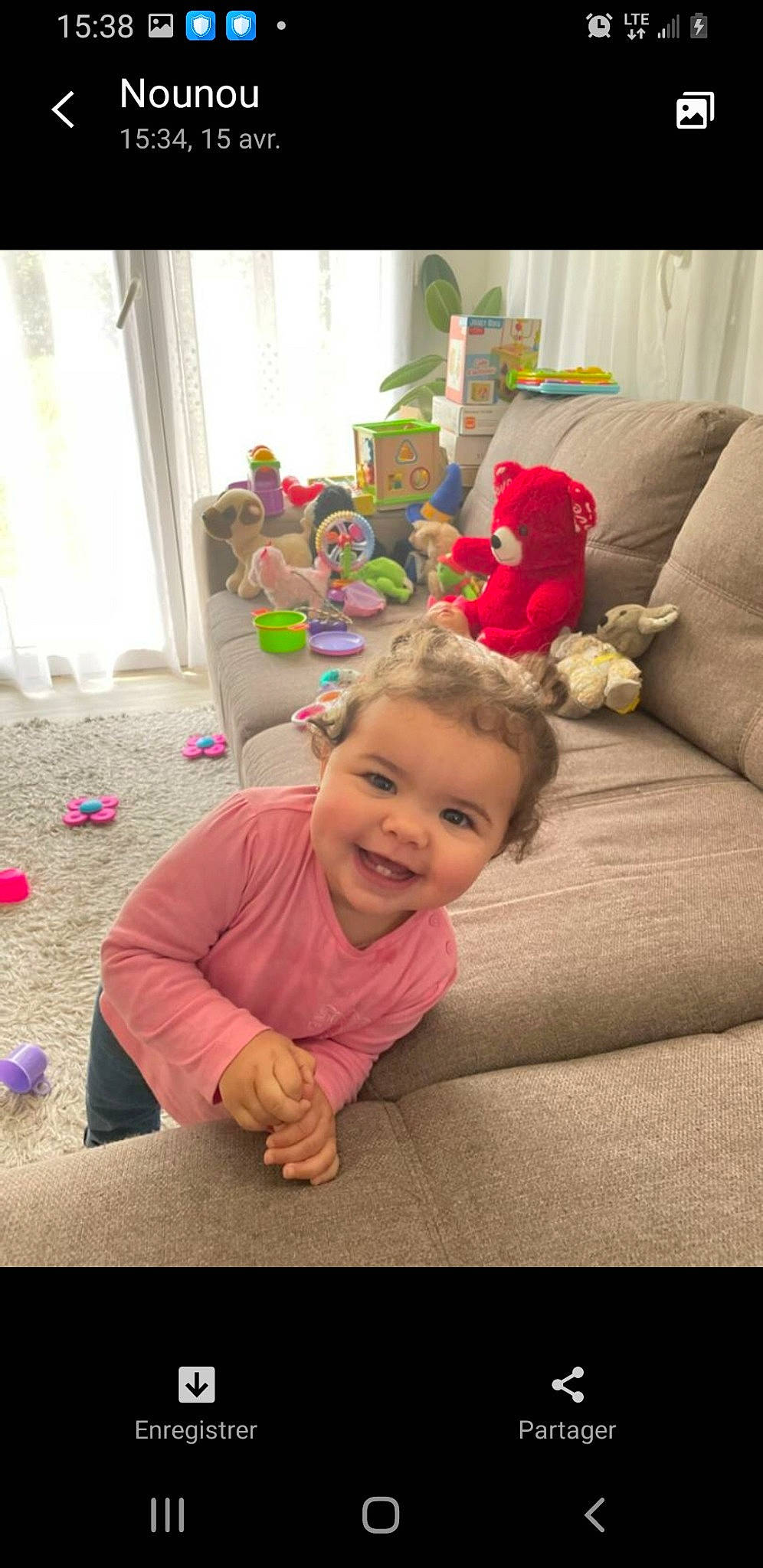 Maissane participe au concours pour gagner de l'argent avec cette photo : baby, baby_toddler_clothing, child, comfort, couch, curtain, event, floor, flooring, fun, happy, joy, person, pink, play, sitting, skin, smile, stuffed_toy, toddler
