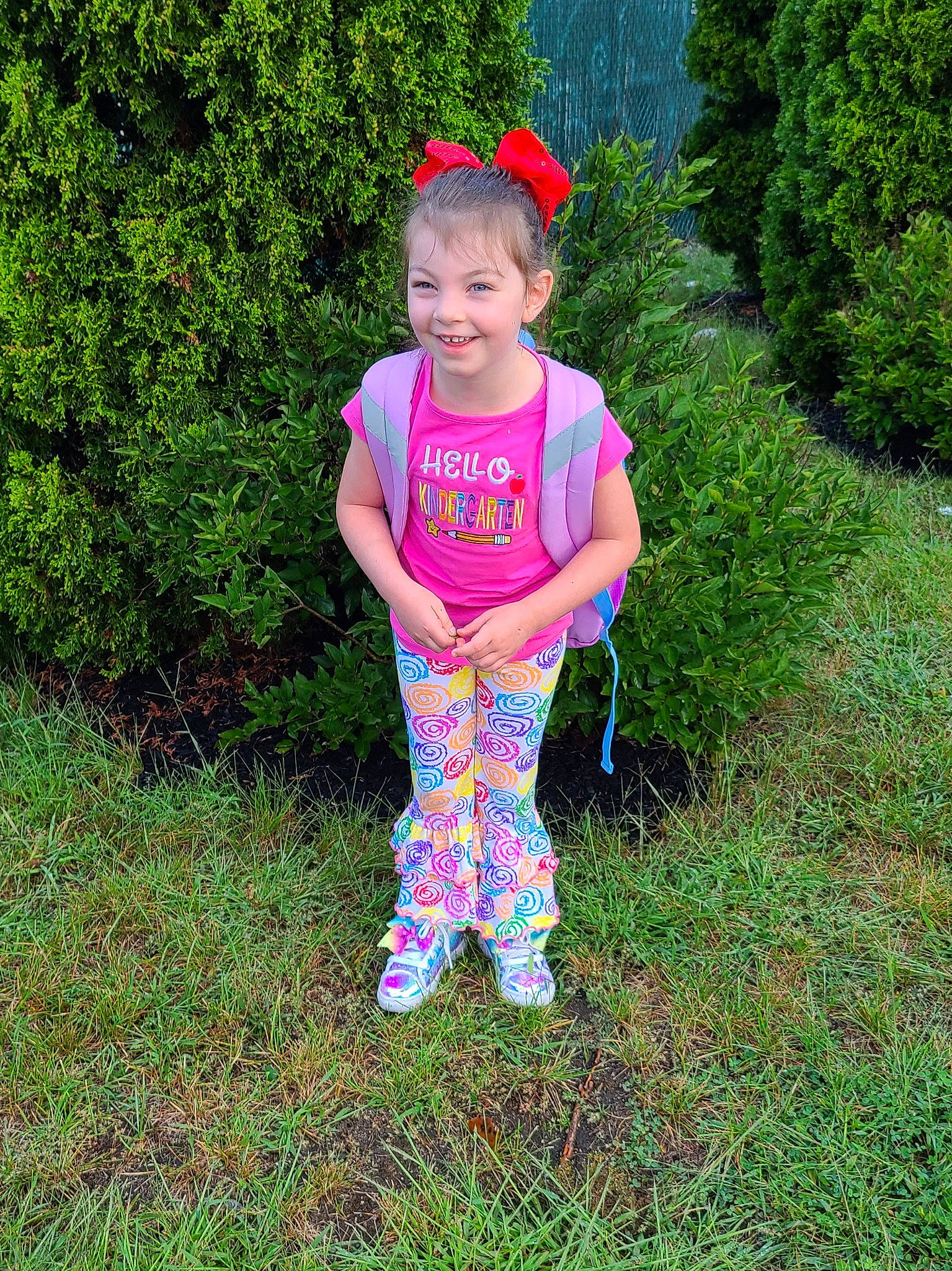 Elena joined the competition — help win amazing prizes! baby_toddler_clothing, child, electric_blue, face, grass, grass_family, grassland, happy, joy, lawn, leaf, magenta, meadow, outerwear, pattern, people_in_nature, person, pink, plant, smile