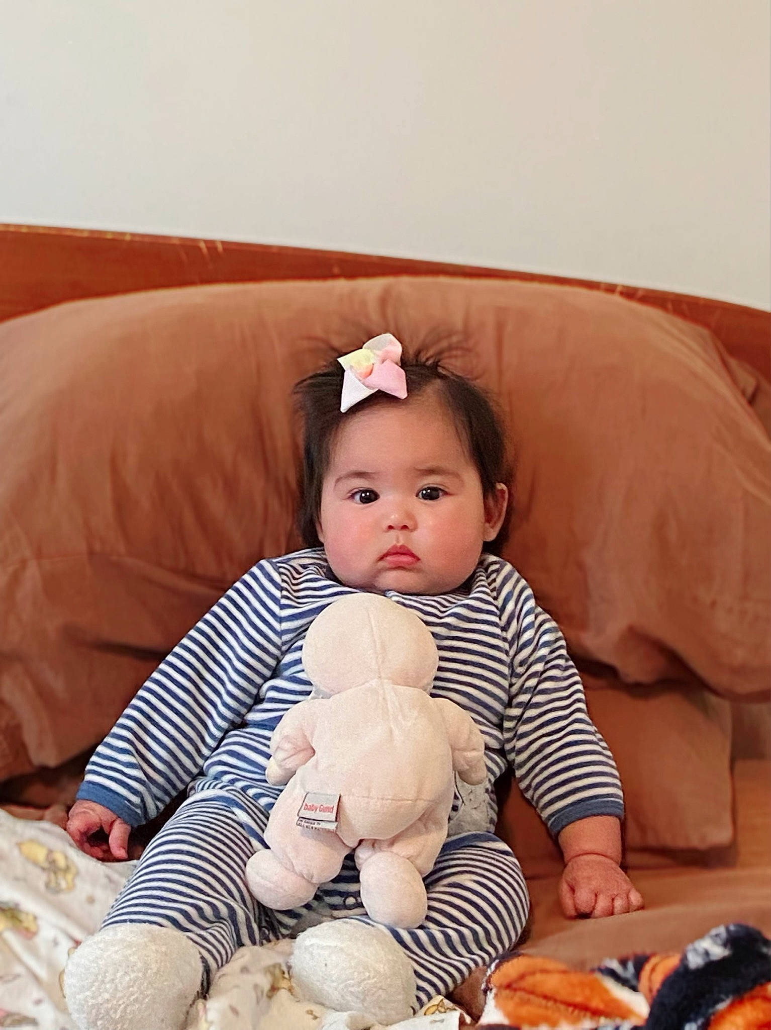 Amara Faith joined the competition — help win amazing prizes! baby, baby_playing_with_toys, baby_sleeping, baby_toddler_clothing, child, comfort, couch, happy, human_body, linens, person, product, skin, sleeve, sock, stuffed_toy, teddy_bear, textile, thigh, toddler