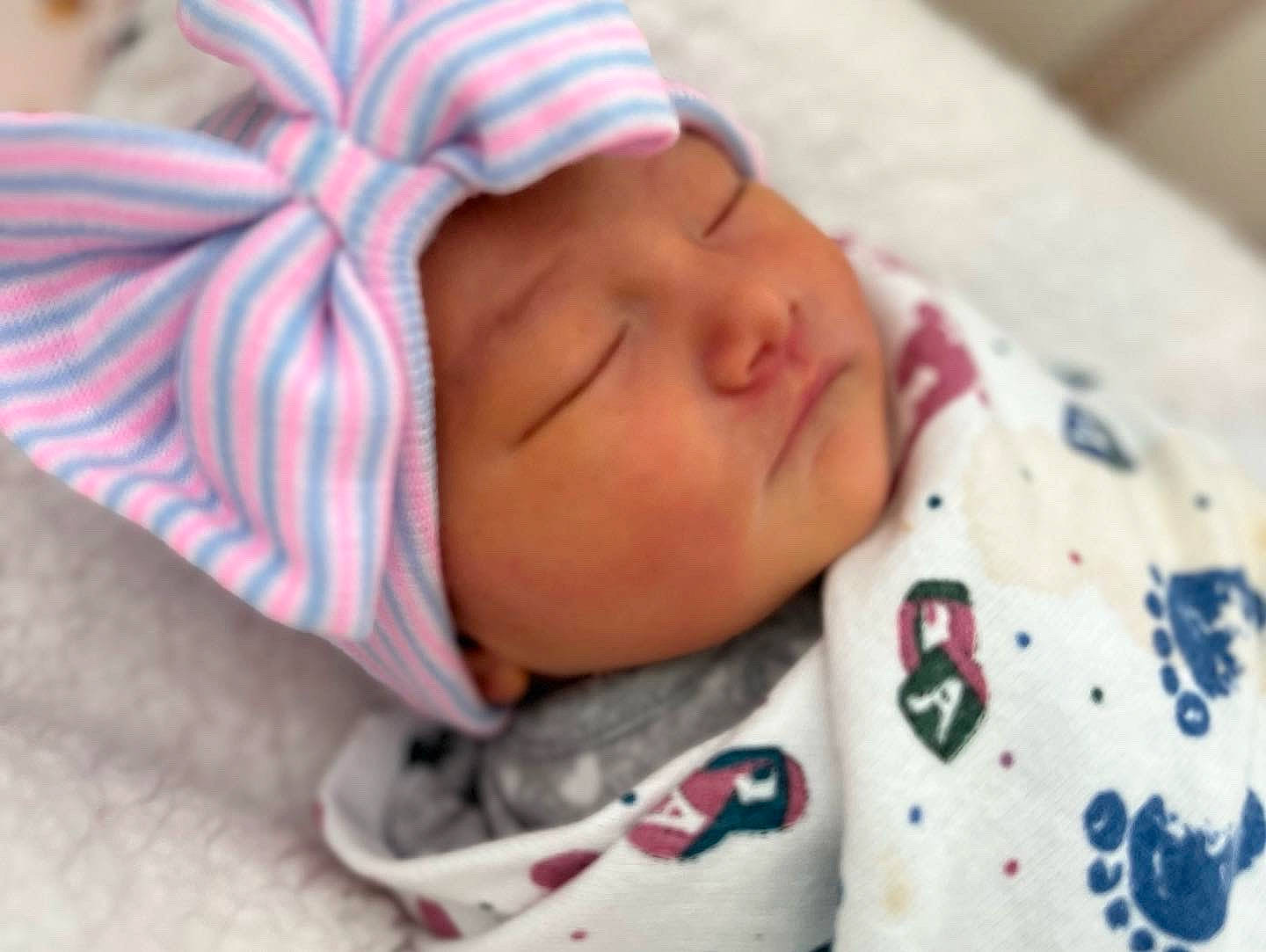 Cali Alyssa is registered to the contest to win money with this photo: baby, baby_products, baby_sleeping, baby_toddler_clothing, bedtime, carmine, cheek, child, comfort, headwear, linens, nap, nose, pattern, person, room, skin, sleep, sleeve, textile