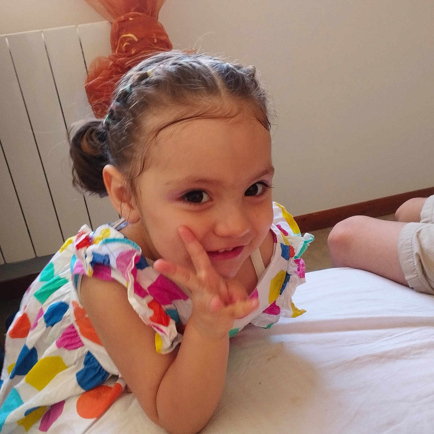 Aurora Isabella is registered to the contest to win money with this photo: baby, bed, bedroom, bodypart, clothing, couch, cushion, dress, face, finger, furniture, hand, head, homedecor, indoors, person, photography, portrait, room, wood