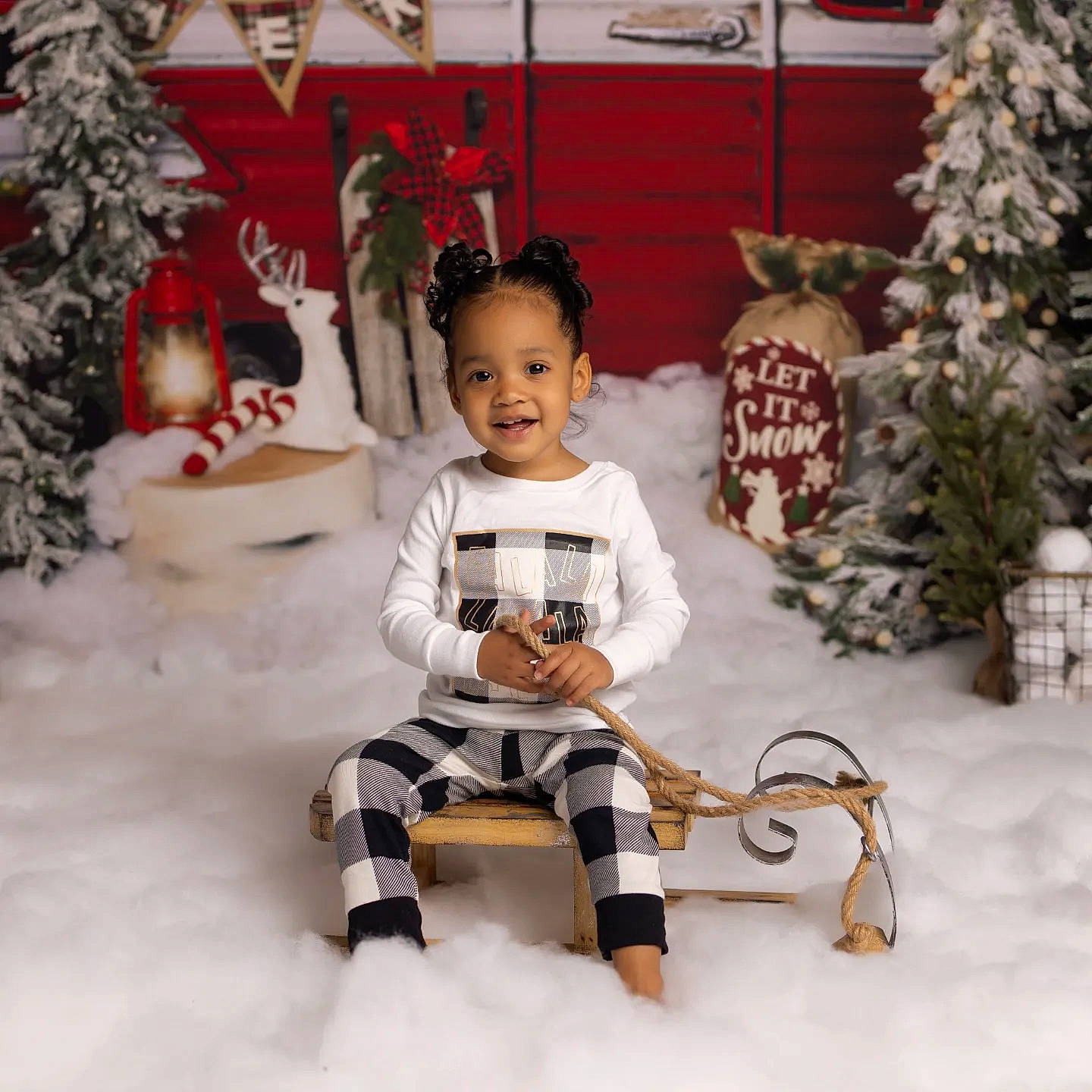 Kassi is registered to the contest to win money with this photo: baby_toddler_clothing, child, christmas, christmas_eve, event, freezing, fun, fur, happy, holiday, joy, ornament, pattern, person, room, sitting, sleeve, smile, snow, toddler