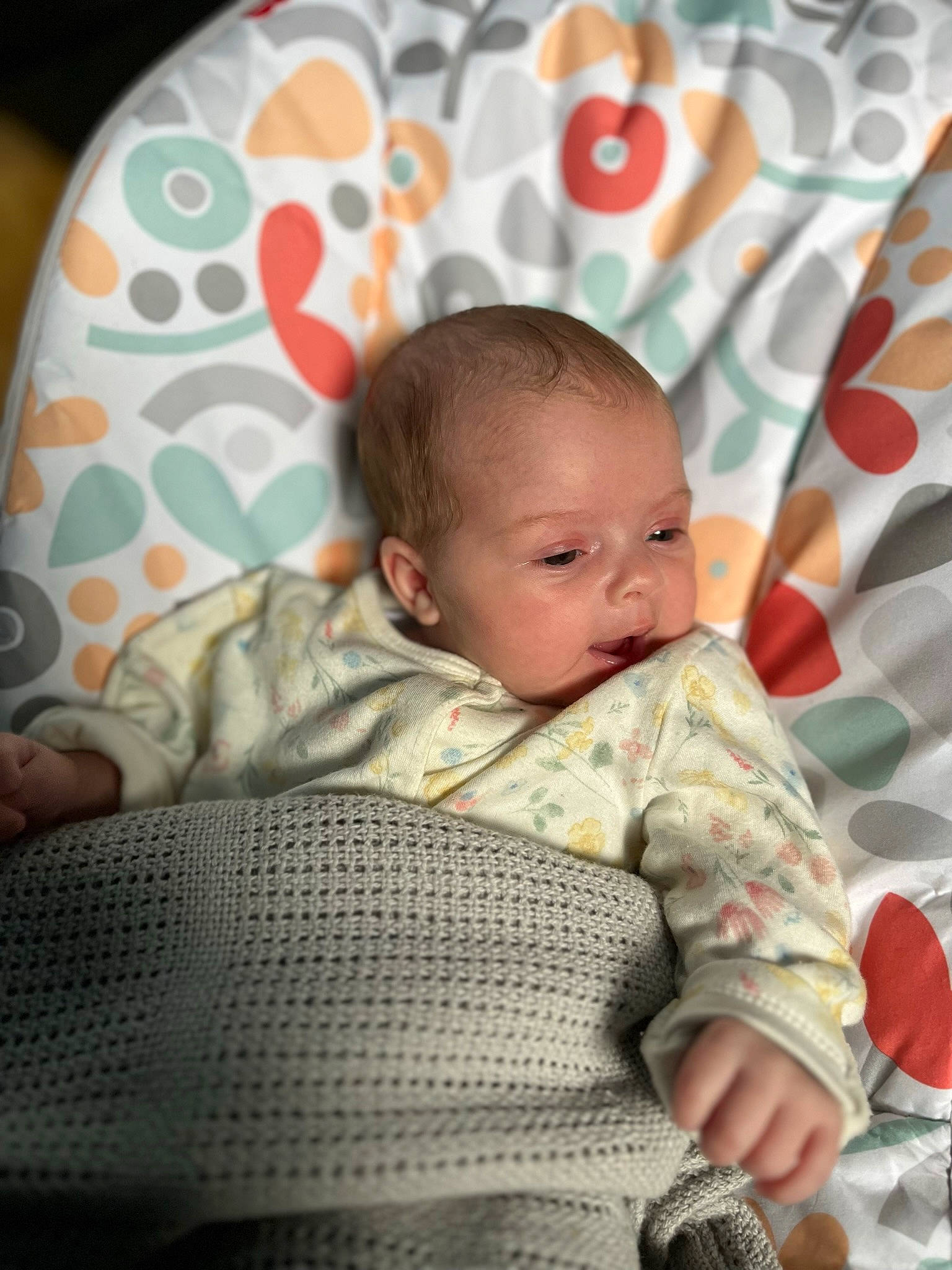 Delilah joined the competition — help win amazing prizes! baby, baby_products, baby_safety, baby_toddler_clothing, beauty, chair, cheek, child, comfort, facial_expression, flooring, happy, linens, nose, pattern, person, portrait_photography, room, sitting, skin