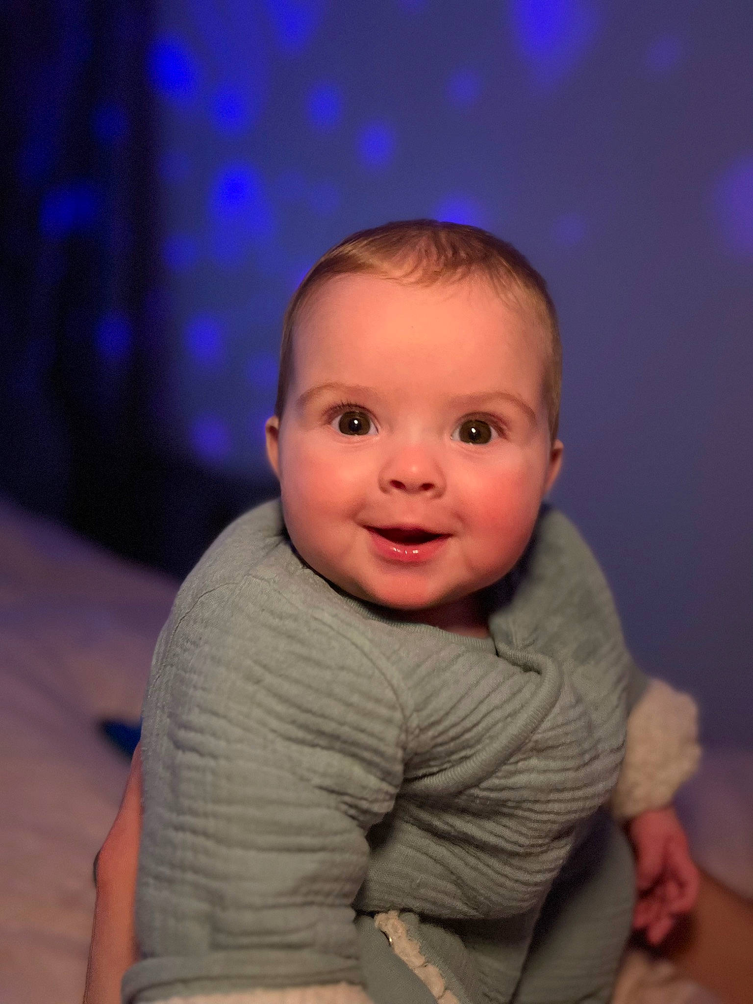 Delilah joined the competition — help win amazing prizes! baby, baby_toddler_clothing, cheek, child, chin, comfort, electric_blue, flash_photography, flooring, fun, gesture, happy, iris, laugh, nose, person, sitting, skin, sleeve, smile