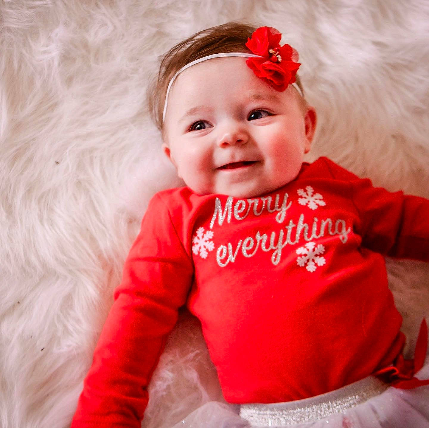 Jade is registered to the contest to win money with this photo: baby, baby_toddler_clothing, child, child_model, costume_accessory, ear, facial_expression, fashion_accessory, fur, hair_accessory, headband, headpiece, iris, joy, lip, mouth, person, pink, portrait_photography, red