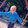 balance, blue_jacket, child, climbing, daylight, footwear, happy, nature, outdoor, pants, park, person, play, playground, recreation, rope, sand, smile, sunlight, trees