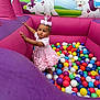 Sòul is registered to the contest to win money with this photo: child, toddler, ball_pit, pink_dress, crown, unicorn_mural, rainbow, colorful_balls, party, play_area, curious, indoor, celebration, happy, fun, toy, cute, festive, young_child, birthday