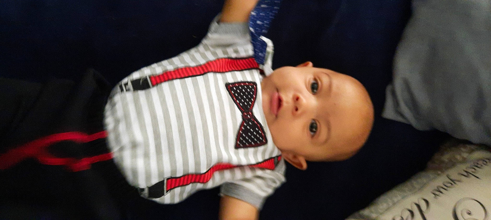 Jaxsyn joined the competition — help win amazing prizes! baby, baby_toddler_clothing, carmine, cheek, child, chin, comfort, elbow, event, facial_expression, fun, head, mammal, nose, pattern, person, skin, sleeve, sock, textile