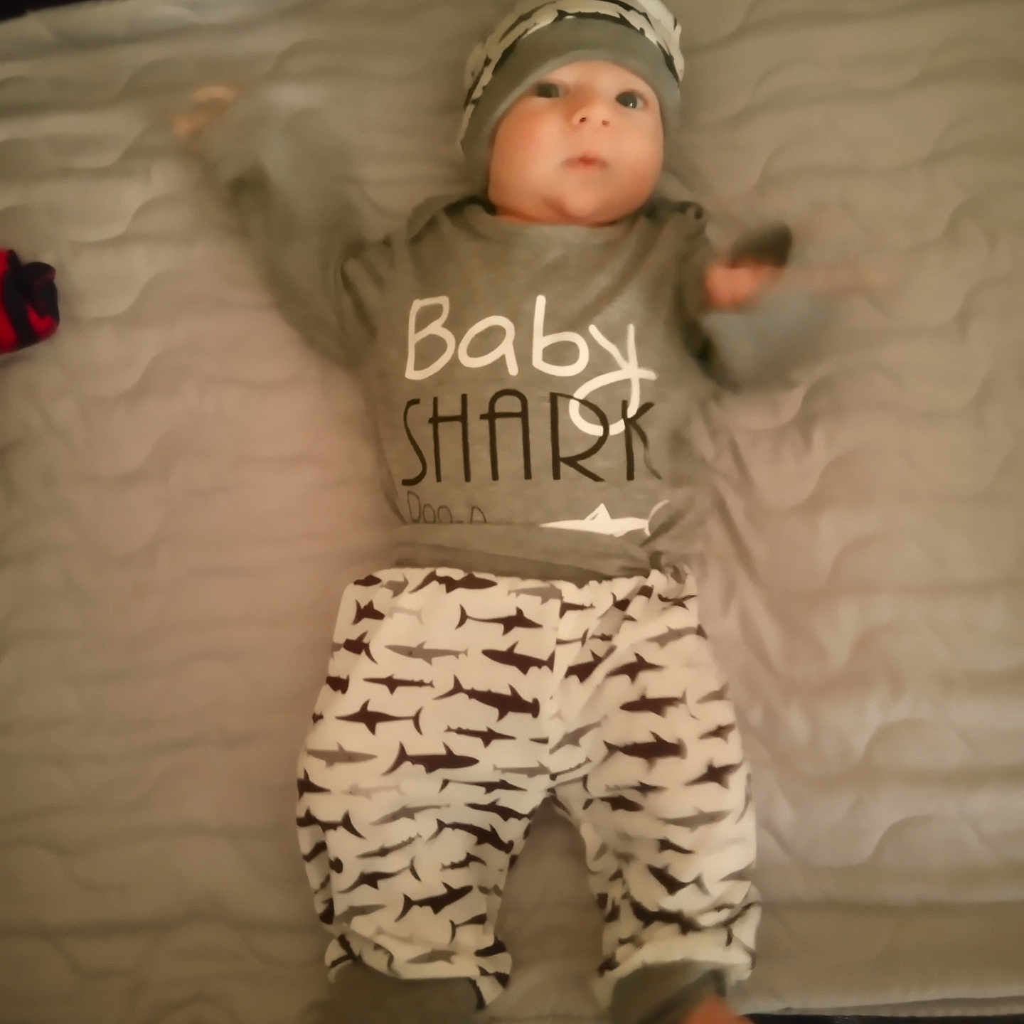 Brantley is registered to the contest to win money with this photo: baby, bed, bodypart, bonnet, cap, clothing, crib, face, finger, furniture, hand, hat, head, infantbed, newborn, pants, person, photography, portrait, t_shirt