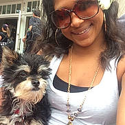 Major joined the competition — help win amazing prizes! accessory, close_up, collar, crowd, dog, flower_hair, furry, jewelry, necklace, outdoor, person, pet, puppy, selfie, smiling, storefront, sunglasses, tag, tank_top, woman