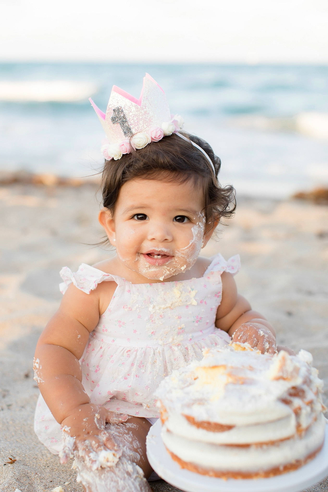 Katerina is registered to the contest to win money with this photo: baby, beach, bridal_accessory, bridal_clothing, child, dress, event, flash_photography, fun, happy, icing, ingredient, joy, person, pink, recipe, sand, shore, skin, sugar_cake