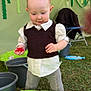 Lyah participe au concours pour gagner de l'argent avec cette photo : baby, bucket, casual, child, curious, decorations, grass, green, nature, outdoor, pants, person, plastic, playtime, red_toy, shirt, standing, toddler, toy, vest