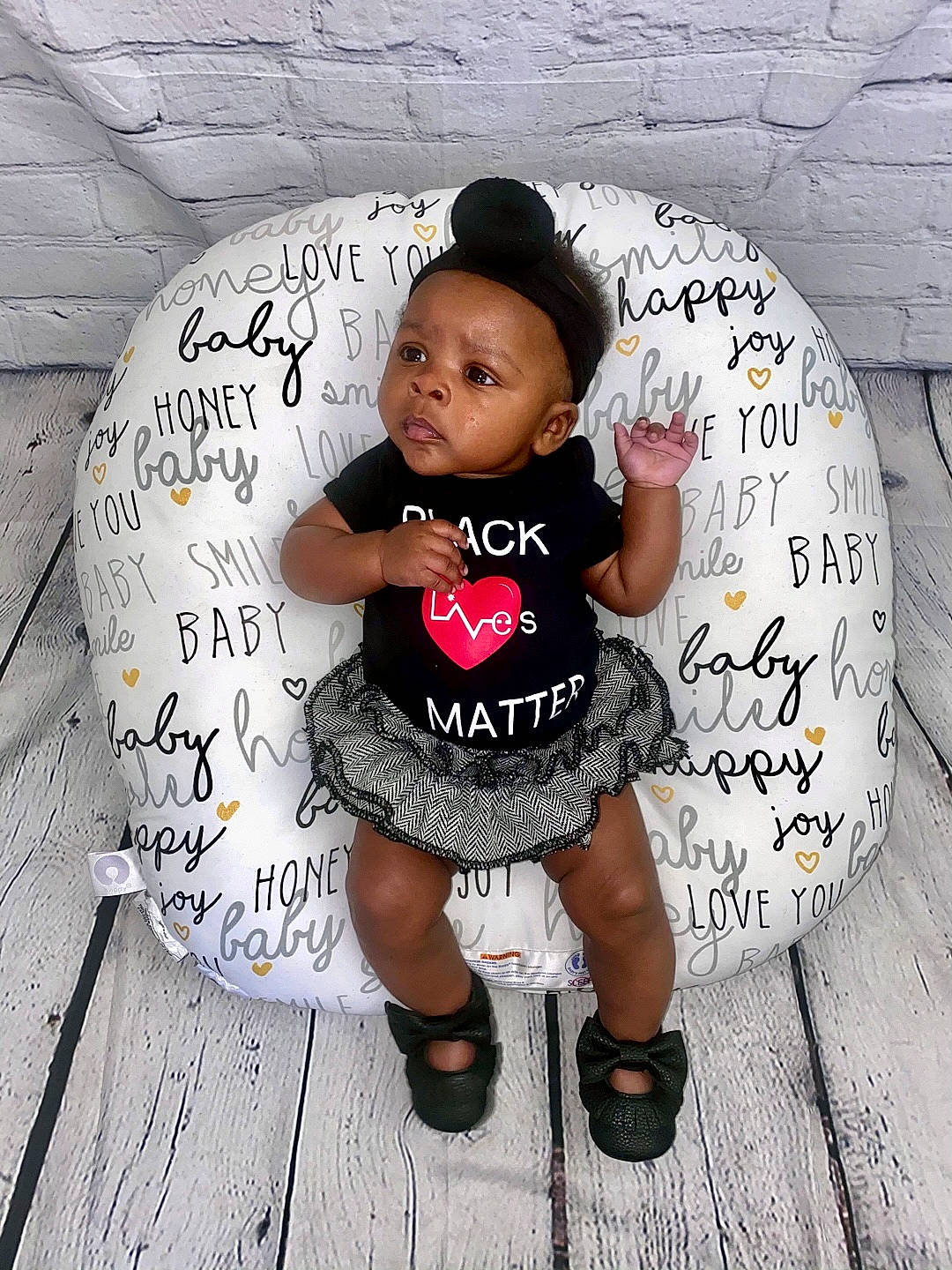 Kamiyah joined the competition — help win amazing prizes! baby, baby_toddler_clothing, child, child_model, cool, day_dress, handwriting, pattern, person, photo_caption, wood_flooring, writing