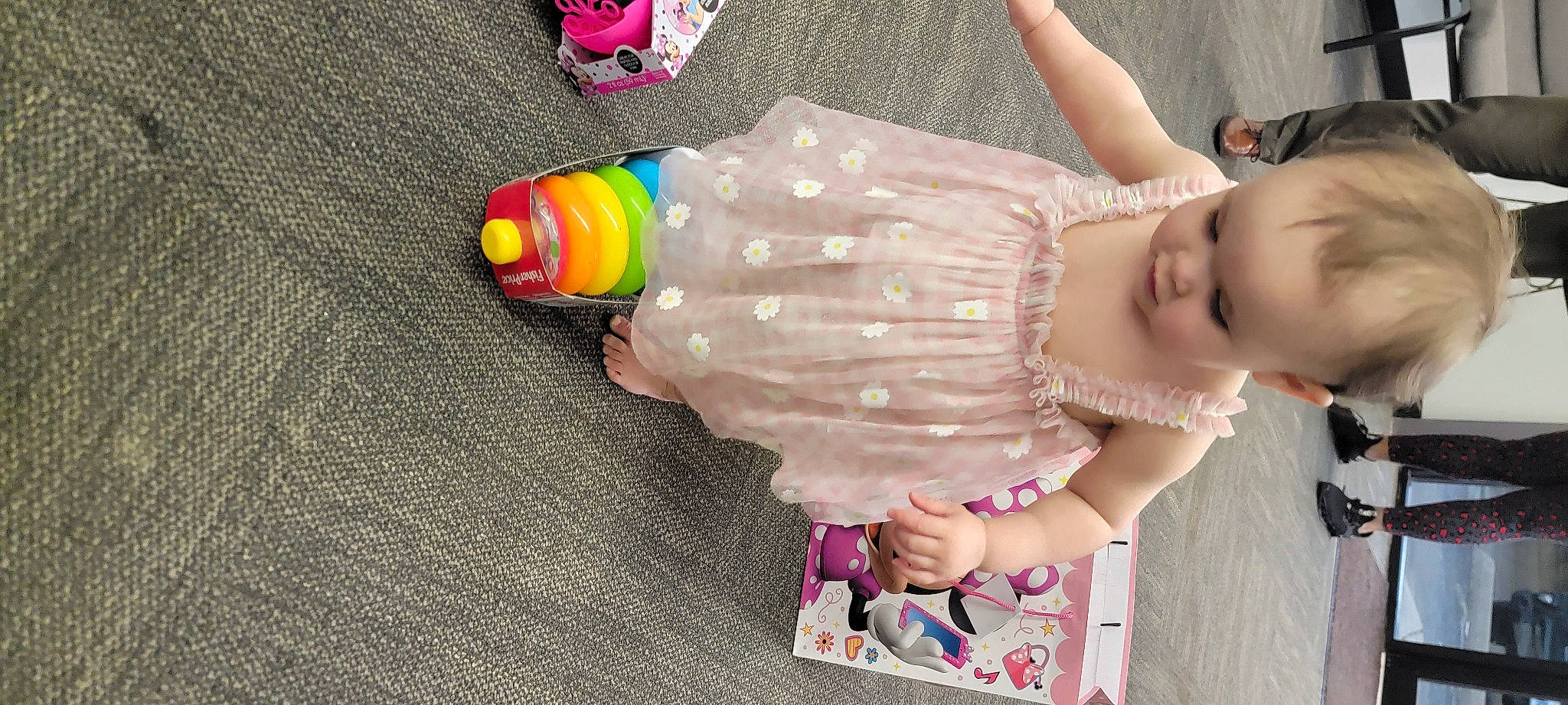 Genesis is registered to the contest to win money with this photo: baby, baby_products, baby_toddler_clothing, baby_toys, chest, child, finger, fun, hand, happy, nail, pattern, person, pink, plastic, play, sitting, smile, toddler