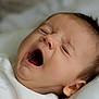 Lucas joined the competition — help win amazing prizes! baby, yawning, close_up, infant, sleepy, face, mouth_open, eyes_closed, white_clothing, skin, head, portrait, newborn, cute, lying_down, soft_light, indoors, peaceful, expression, child