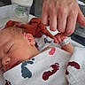 Zayne is registered to the contest to win money with this photo: newborn, baby, sleeping, blanket, footprints, hand, adult, hospital, bottle, infant, closeup, skin, resting, parent, bond, togetherness, hospital_bed, comfort, peaceful, cute