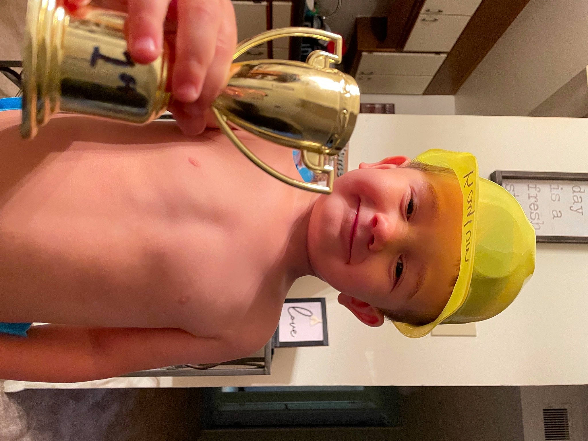 Kaylum joined the competition — help win amazing prizes! abdomen, barechested, bathing, chest, elbow, fun, happy, hat, headwear, jaw, joy, mouth, muscle, person, personal_protective_equipment, room, service, smile, throat, thumb