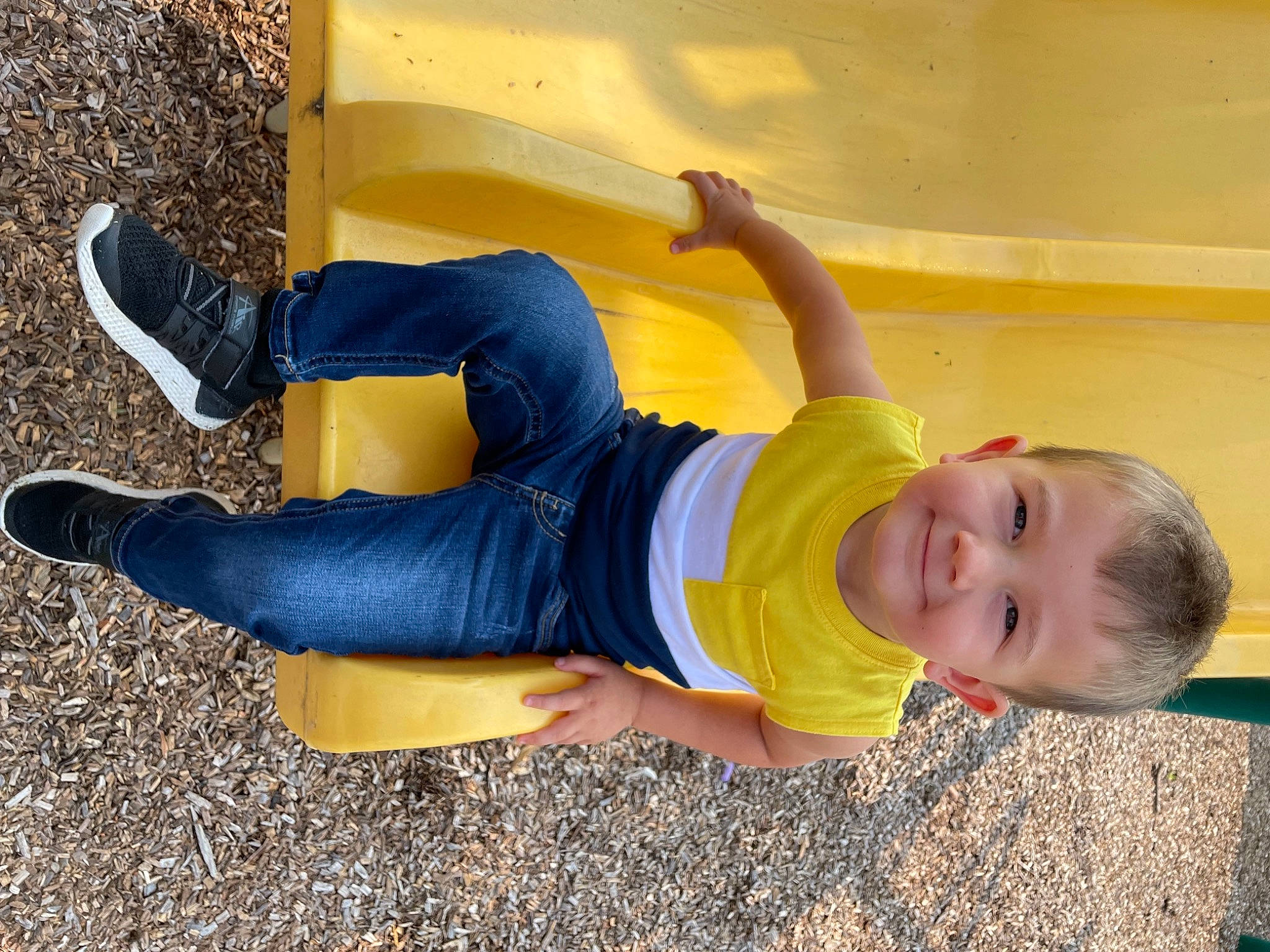 Kaylum is registered to the contest to win money with this photo: baby_toddler_clothing, denim, footwear, fun, grass, happy, hat, human_leg, jeans, joy, knee, leg, leisure, person, plant, shoe, smile, sneakers, t_shirt, thigh