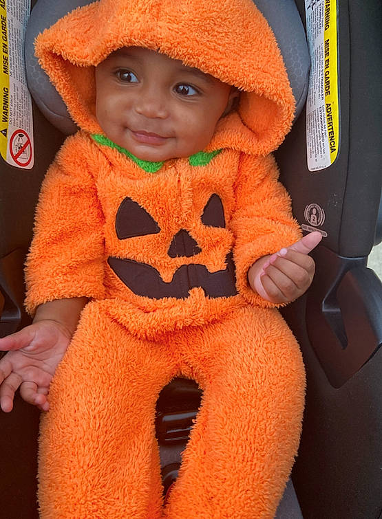 Kaelyn joined the competition — help win amazing prizes! baby, baby_toddler_clothing, cap, child, chin, cool, eye, face, fun, happy, hat, headwear, orange, outerwear, person, personal_protective_equipment, red, skin, sleeve, smile
