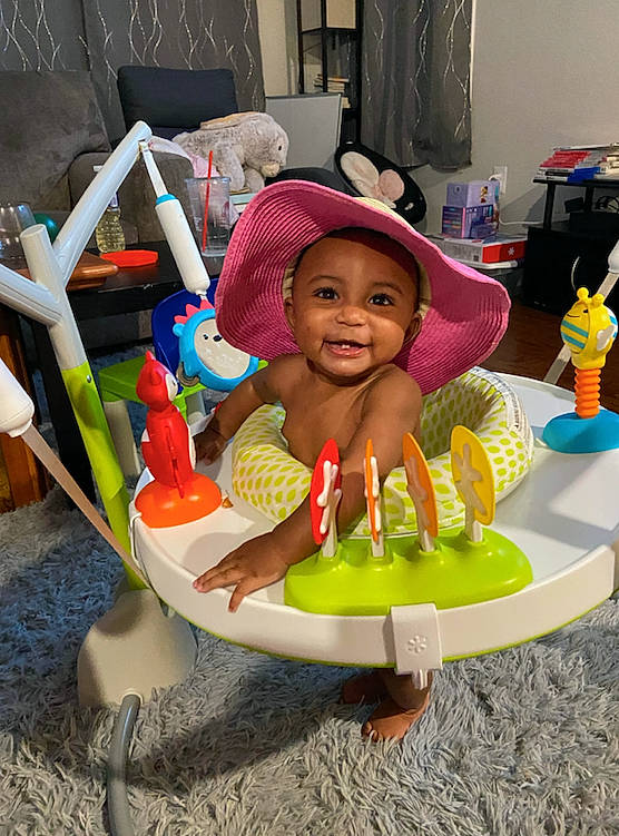 Kaelyn joined the competition — help win amazing prizes! baby, baby_products, baby_toys, cap, child, fashion_accessory, fun, happy, hat, headgear, joy, leisure, outdoor_play_equipment, person, play, recreation, sitting, smile, tire, toddler