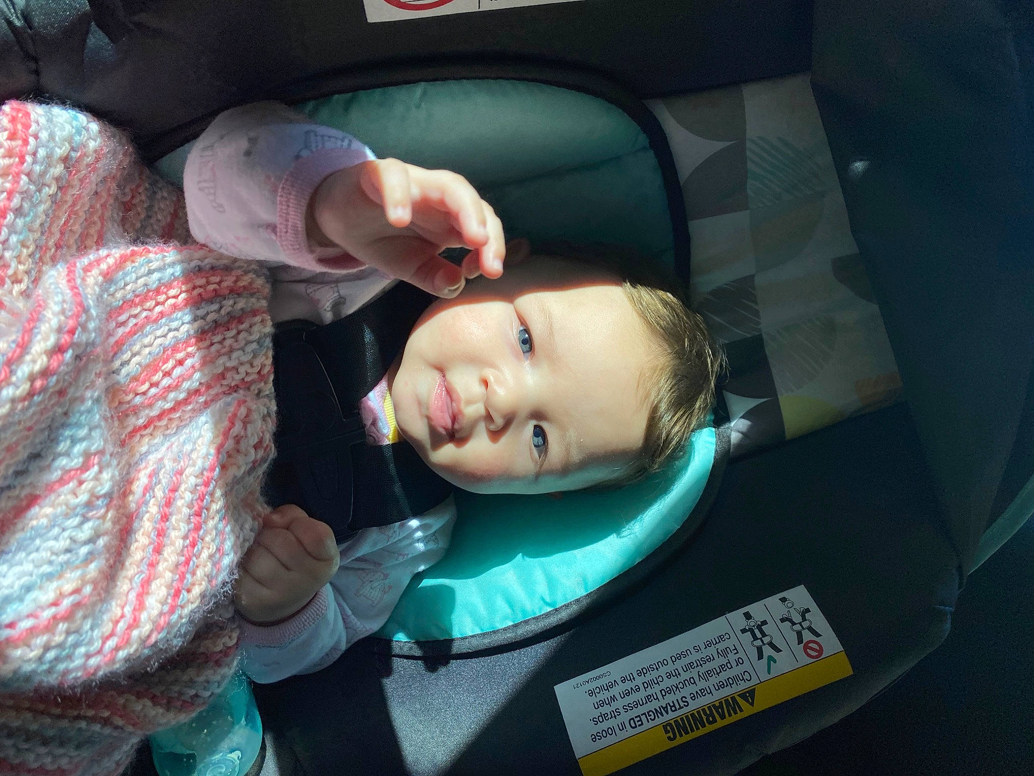 Kamryn is registered to the contest to win money with this photo: auto_part, automotive_design, automotive_exterior, baby_products, bumper, car_seat, child, comfort, family_car, finger, fun, gesture, jaw, motor_vehicle, mouth, nose, person, smile, tartan, toddler