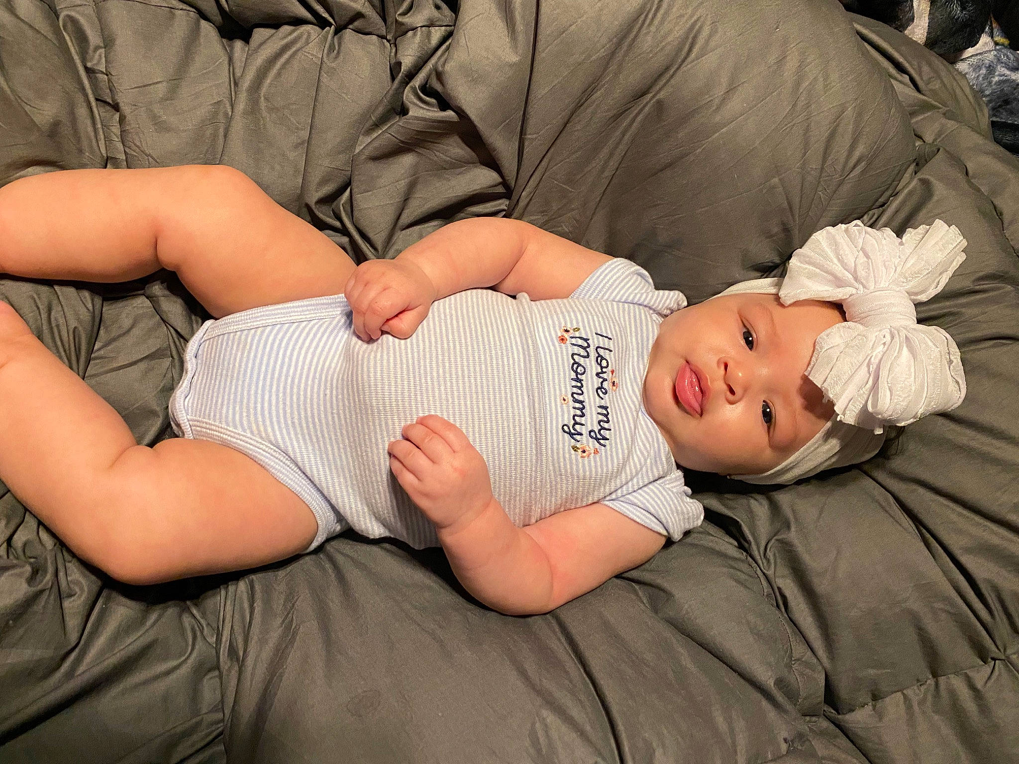 Kamryn is registered to the contest to win money with this photo: comfort, couch, eye, facial_expression, finger, gesture, glasses, hair, hand, head, headwear, human_body, joint, knee, lap, leg, mouth, muscle, person, skin