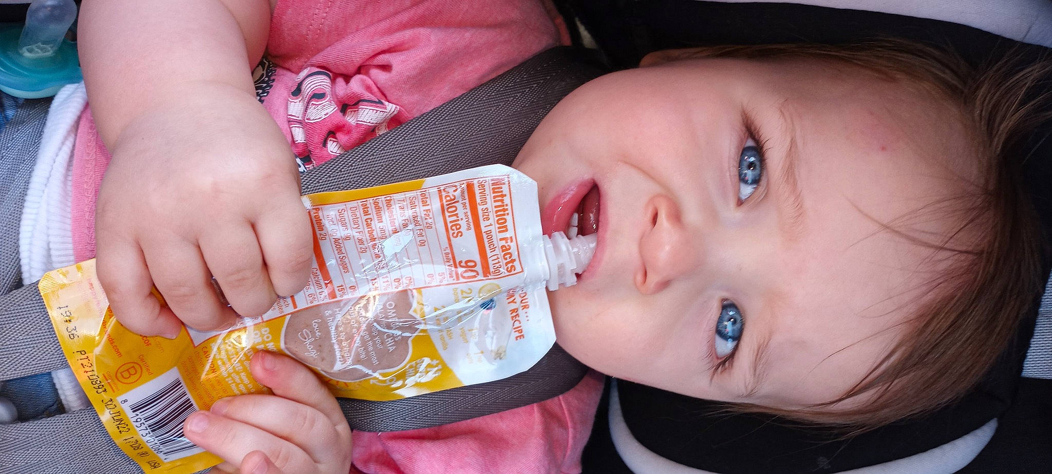 Kainen is registered to the contest to win money with this photo: baby, baby_toddler_clothing, cheek, chin, eyelash, finger, food, hand, happy, iris, lip, mouth, nail, neck, nose, person, pink, product, skin, smile