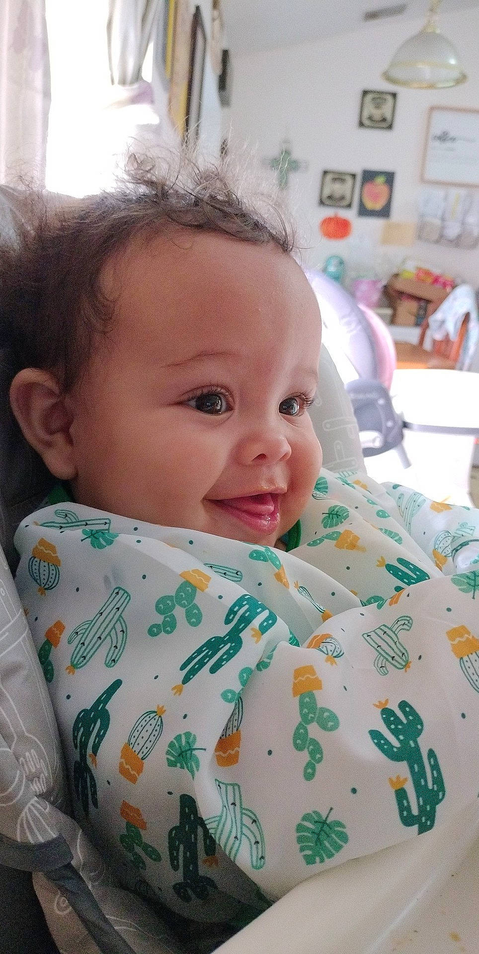 Sebastion is registered to the contest to win money with this photo: baby, baby_toddler_clothing, cheek, child, chin, comfort, eyebrow, eyelash, happy, iris, linens, lip, nose, pattern, person, room, skin, sleeve, smile, t_shirt