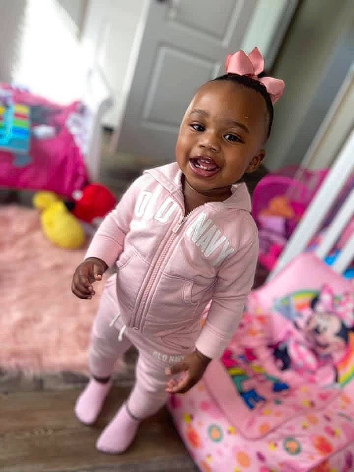 Lauryn joined the competition — help win amazing prizes! baby, baby_toddler_clothing, child, eye, facial_expression, fun, hairstyle, happy, head, joy, magenta, nose, person, pink, purple, skin, sleeve, smile, standing, textile