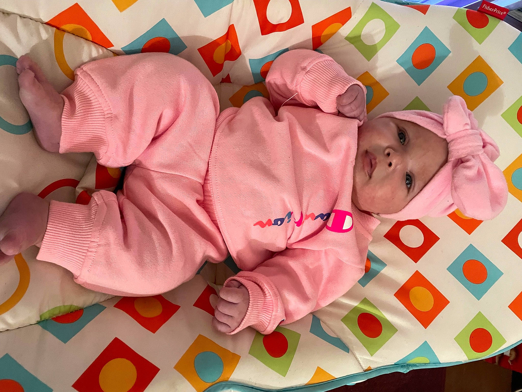 Azlyn is registered to the contest to win money with this photo: baby, baby_products, baby_toddler_clothing, baby_toys, bed_sheet, bedding, bedtime, carmine, child, comfort, design, font, happy, headwear, linens, magenta, pattern, person, pink, sleeve