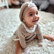 Elena joined the competition — help win amazing prizes! baby, child, smile, beret, beige_outfit, sitting, white_rug, soft_texture, indoor, happy, portrait, cute, infant, face, headwear, cozy, warm, young_child, home, fashion