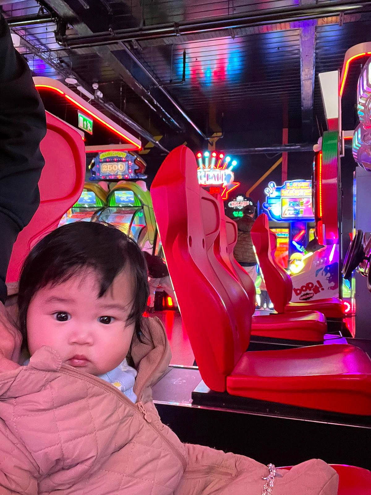 Sky joined the competition — help win amazing prizes! automotive_design, baby, child, electronic_signage, entertainment, event, fun, holiday, leisure, machine, magenta, neon, night, person, pink, purple, recreation, red, room, snapshot