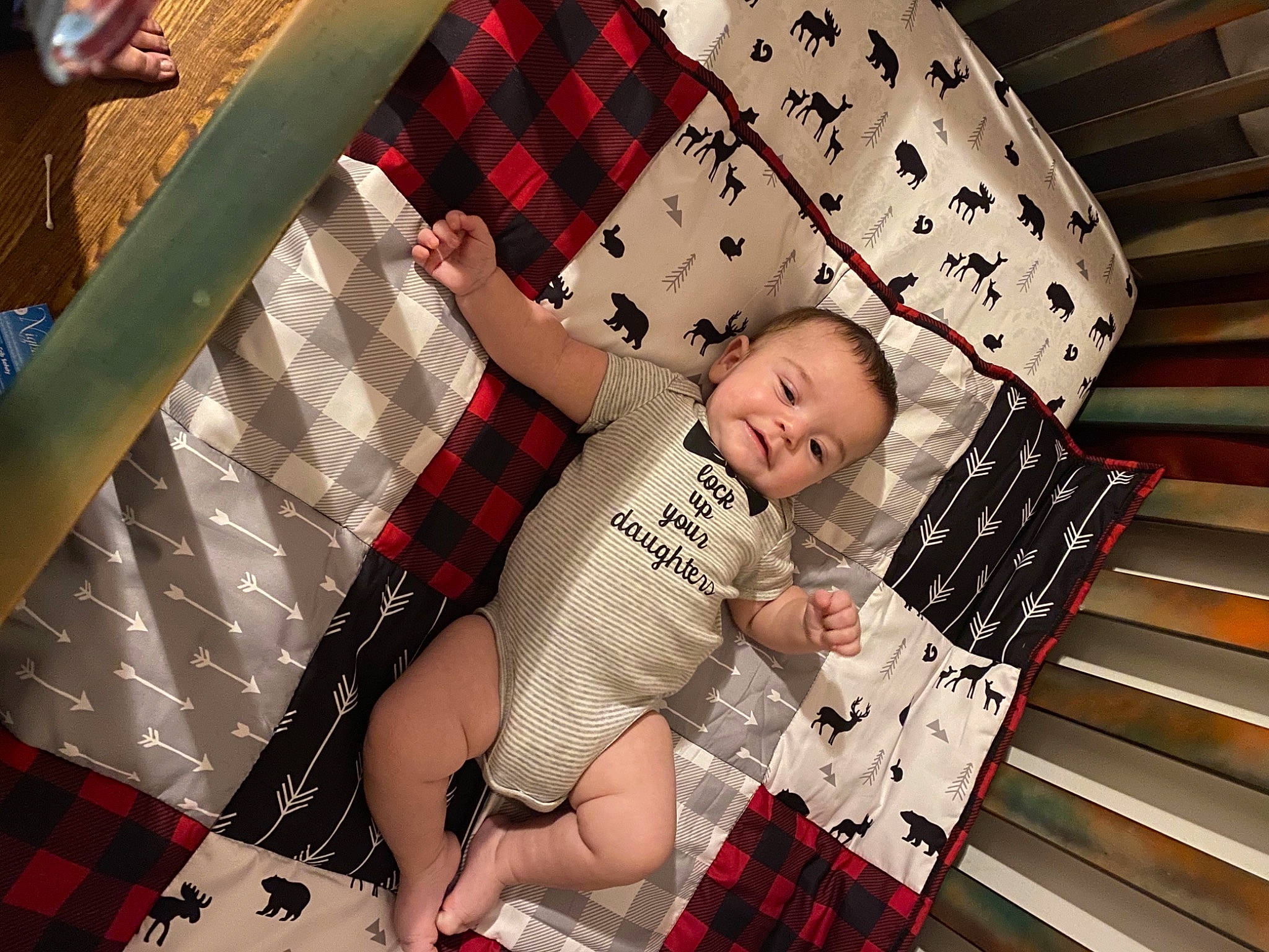 Edward is registered to the contest to win money with this photo: baby, child, design, leg, pattern, person, plaid, tartan, textile, toddler