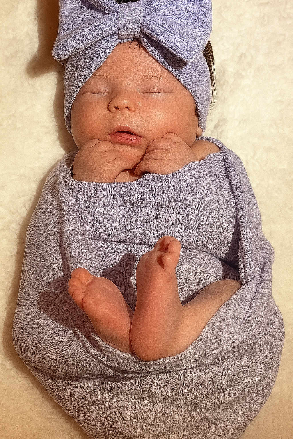 Kamila is registered to the contest to win money with this photo: baby, sleeping, infant, wrapped, blanket, headband, bow, toes, hands, soft_texture, cozy, closeup, cute, peaceful, newborn, portrait, skin, toddler, resting, warm