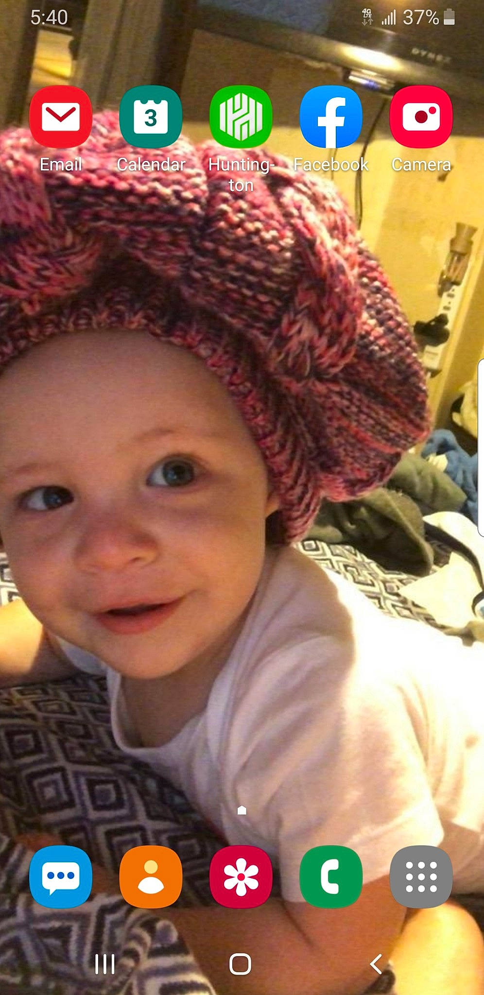 Kellen is registered to the contest to win money with this photo: baby, beanie, bonnet, cap, cheek, child, clothing, cool, crochet, fashion_accessory, hat, headgear, knit_cap, knitting, person, smile, toddler, wool