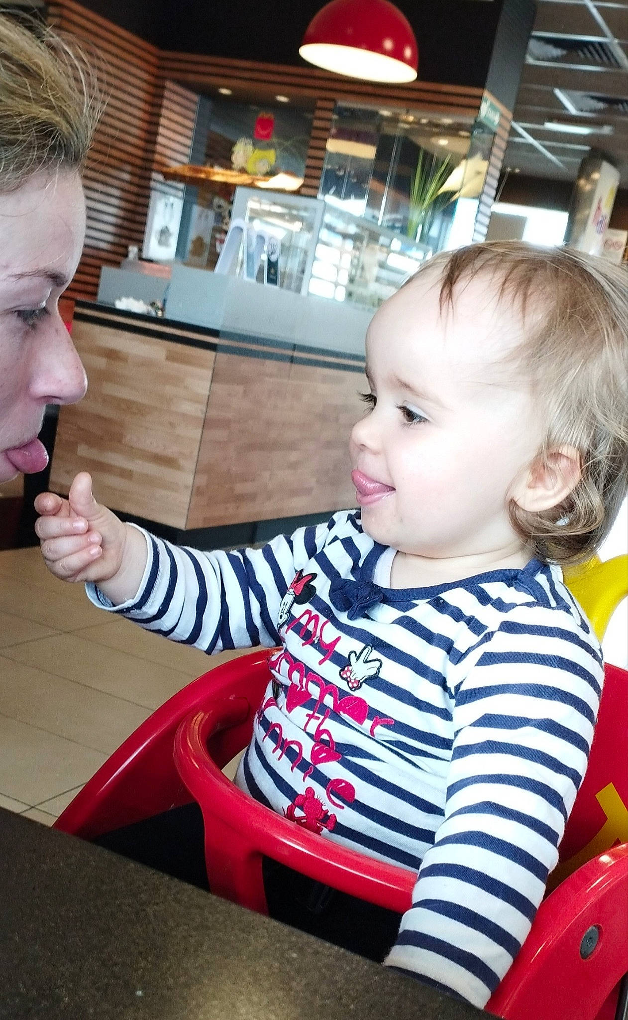 Kélya participe au concours pour gagner de l'argent avec cette photo : baby_toddler_clothing, cheek, chin, facial_expression, finger, fun, gesture, hairstyle, head, human, human_body, nose, organ, person, photograph, product, skin, sleeve, smile, standing