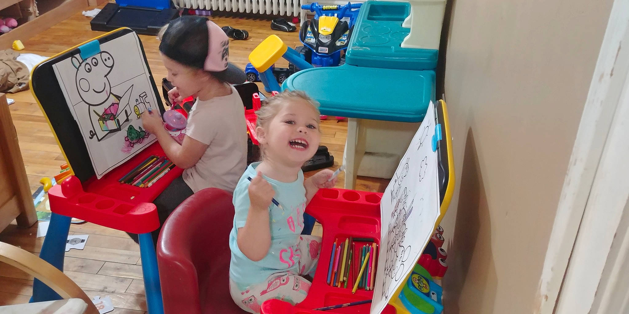 Tatiana is registered to the contest to win money with this photo: art, chair, child, event, fun, joy, kindergarten, learning, leisure, party, person, play, recreation, room, sitting, smile, t_shirt, toddler, toy, toy_vehicle