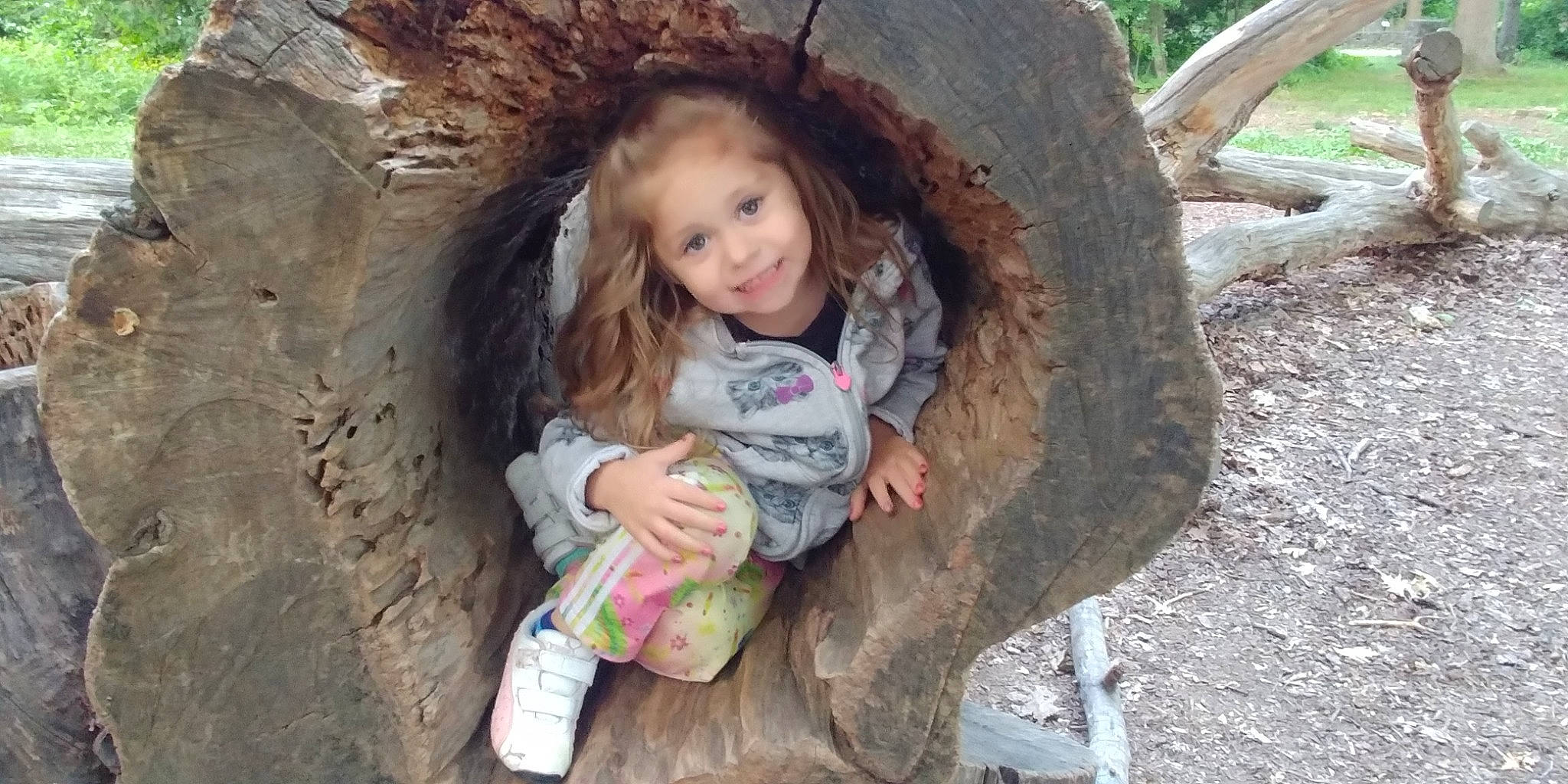 Tatiana joined the competition — help win amazing prizes! adaptation, child, eye, fun, grass, happy, head, human_body, joy, leisure, people_in_nature, person, plant, rock, sitting, skin, smile, soil, toddler, tree