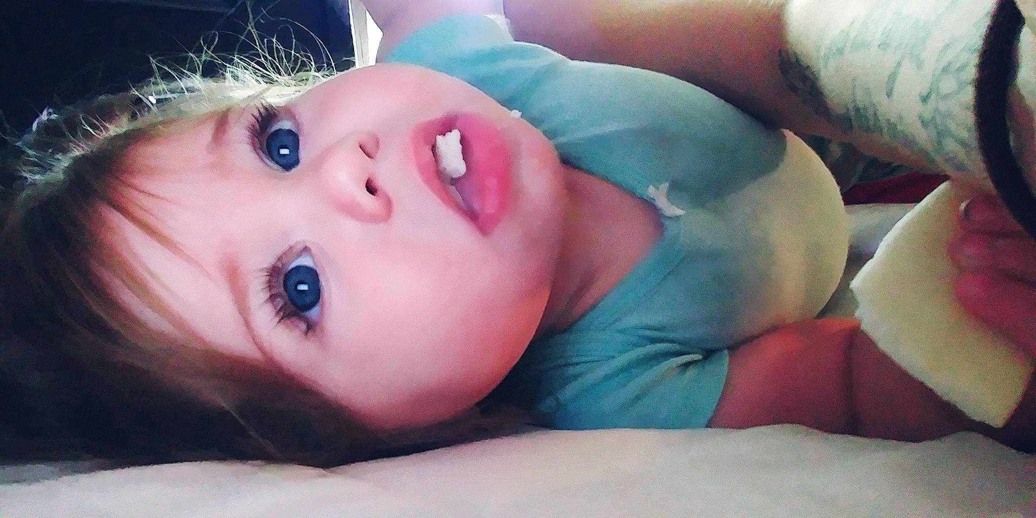 Tatiana Roselynn is registered to the contest to win money with this photo: baby, black_hair, cheek, chest, child, comfort, electric_blue, eyebrow, eyelash, flash_photography, fur, grass, happy, headgear, iris, lip, neck, nose, person, skin