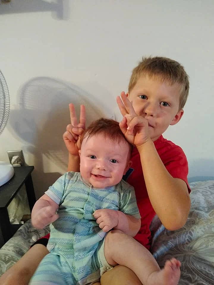 Draiden is registered to the contest to win money with this photo: baby, cheek, child, daughter, ear, face, family, finger, fun, iris, joy, people, person, room, sibling, sitting, skin, smile, toddler, vacation