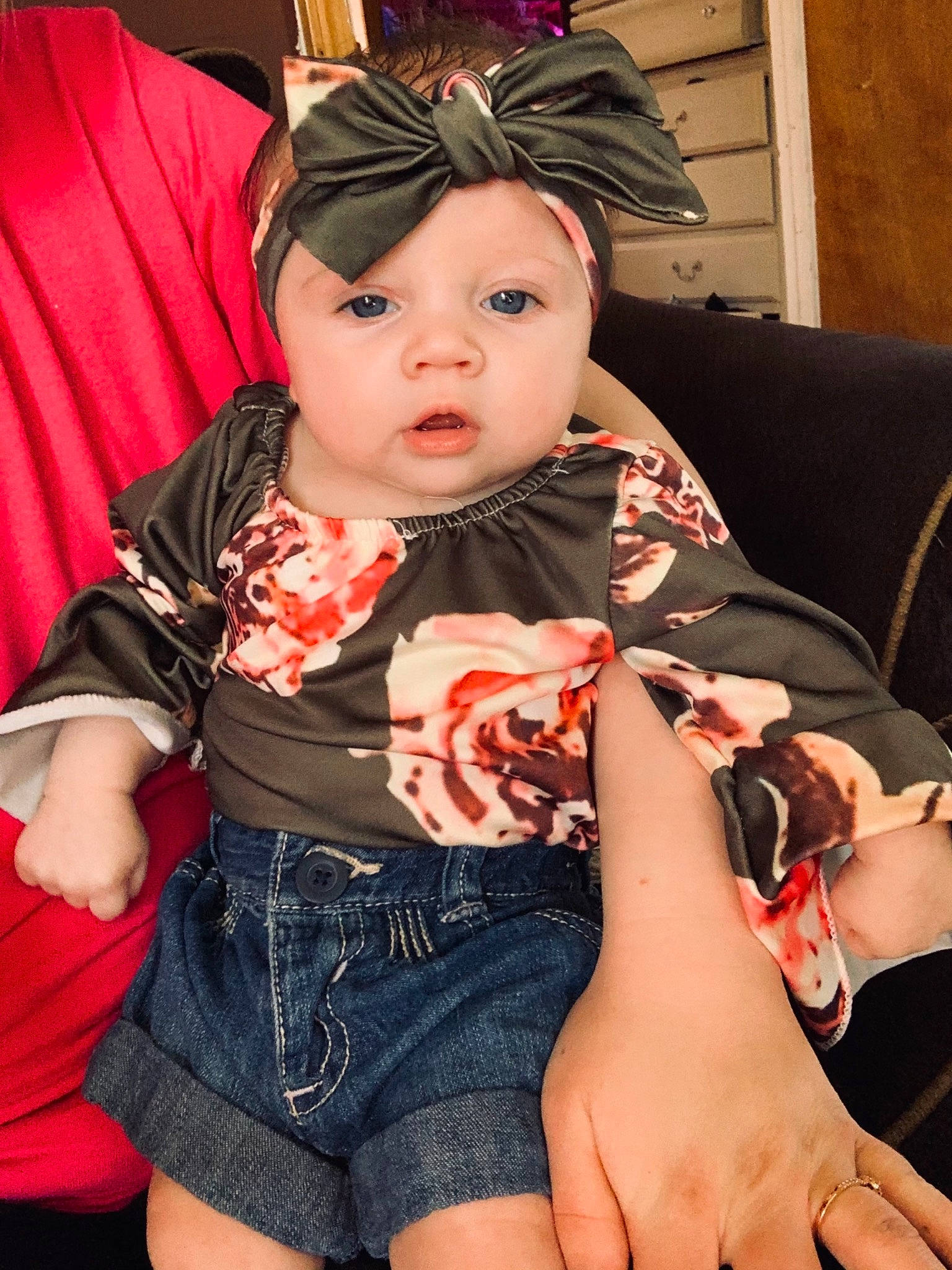 Addison is registered to the contest to win money with this photo: baby, baby_toddler_clothing, cap, child, cool, costume_hat, fun, hat, headwear, human_body, human_leg, leg, organ, pattern, person, sitting, skin, sleeve, textile, thigh