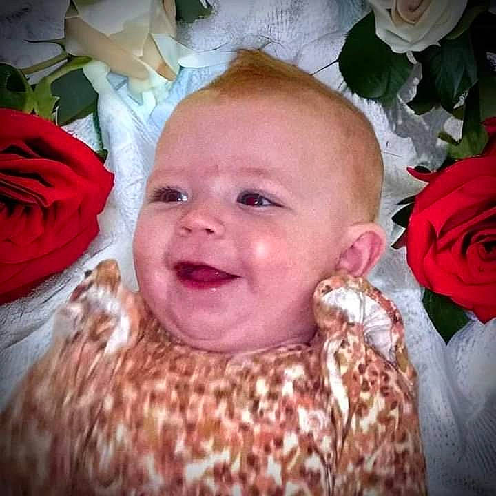 Ellyana is registered to the contest to win money with this photo: baby, baby_laughing, baby_toddler_clothing, cheek, ear, eye, eyebrow, facial_expression, hair, happy, head, iris, lip, mouth, nose, person, pink, plant, skin, smile