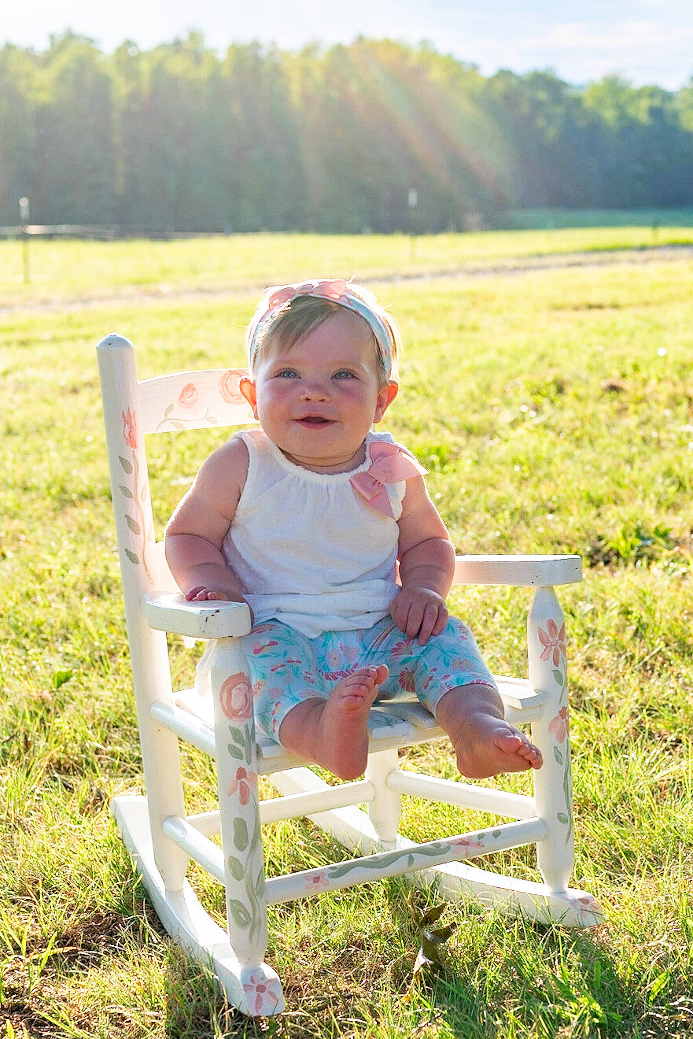 Skylar joined the competition — help win amazing prizes! baby, baby_toddler_clothing, chair, child, fun, grass, grassland, happy, hat, joy, leisure, meadow, outdoor_furniture, people_in_nature, person, plant, recreation, shorts, sitting, sky